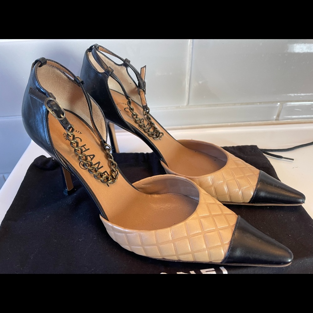 Chanel two tone D’orsay pump with chain strap.